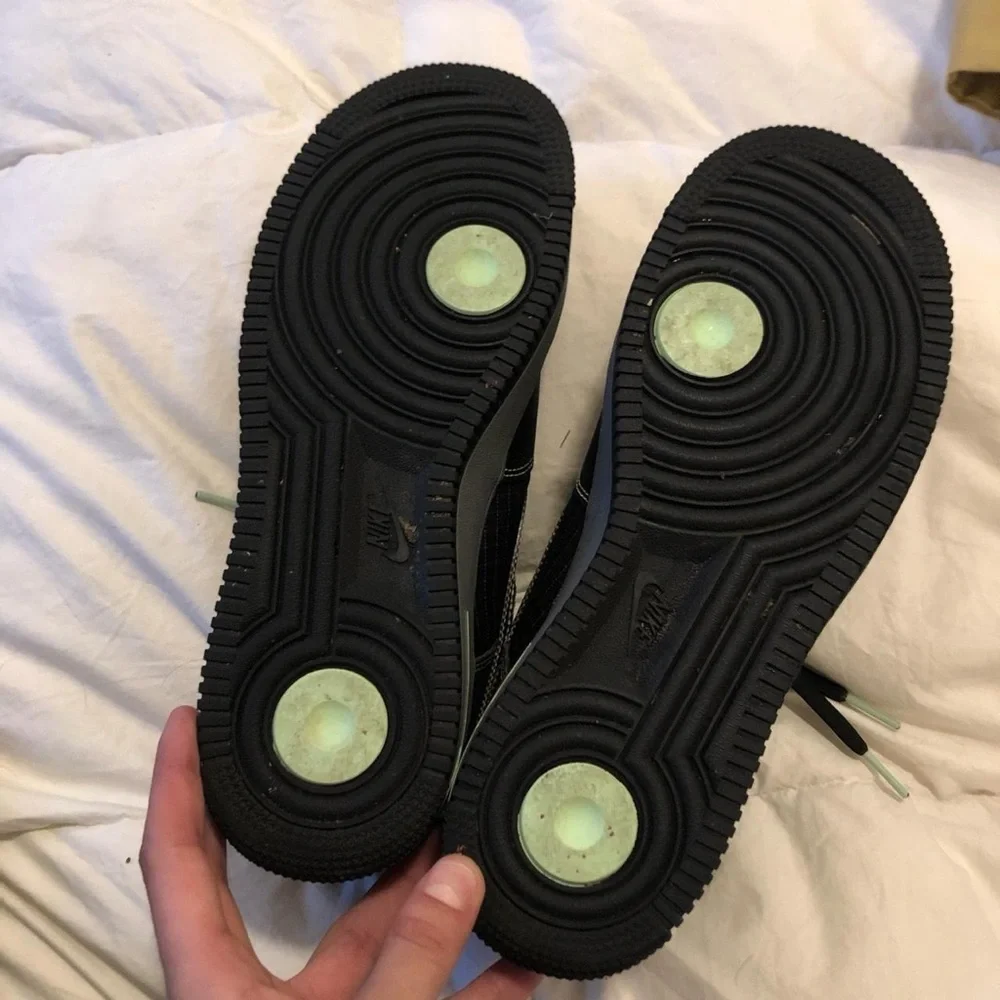 Nike Black and Purple Glow in the dark black AF1s Sneakers.
